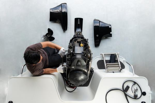 Factory Trained Technician servicing boat at Port Sandfield Marina